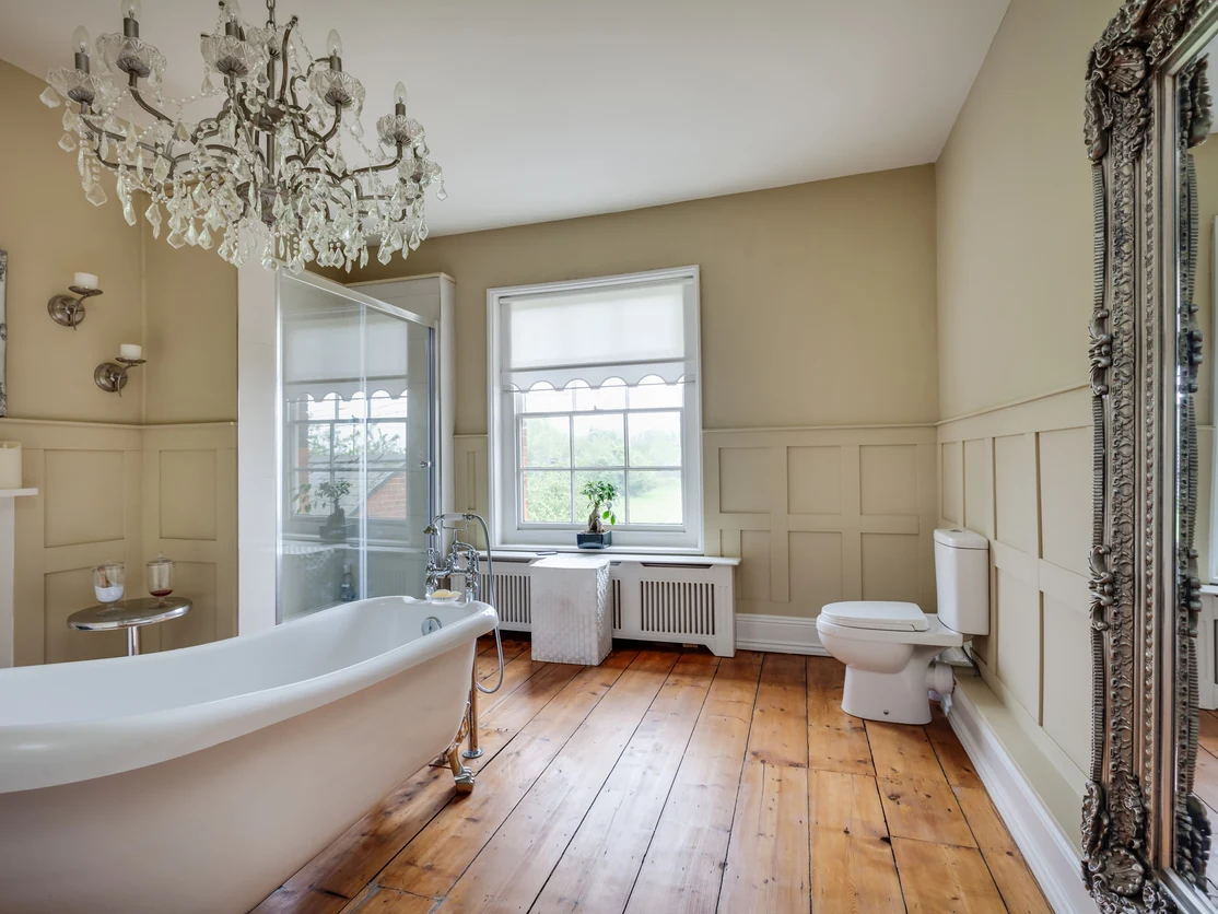 bathroom painting beige sage walls tall sash windows ornate mirror freestanding bath preston rose decor