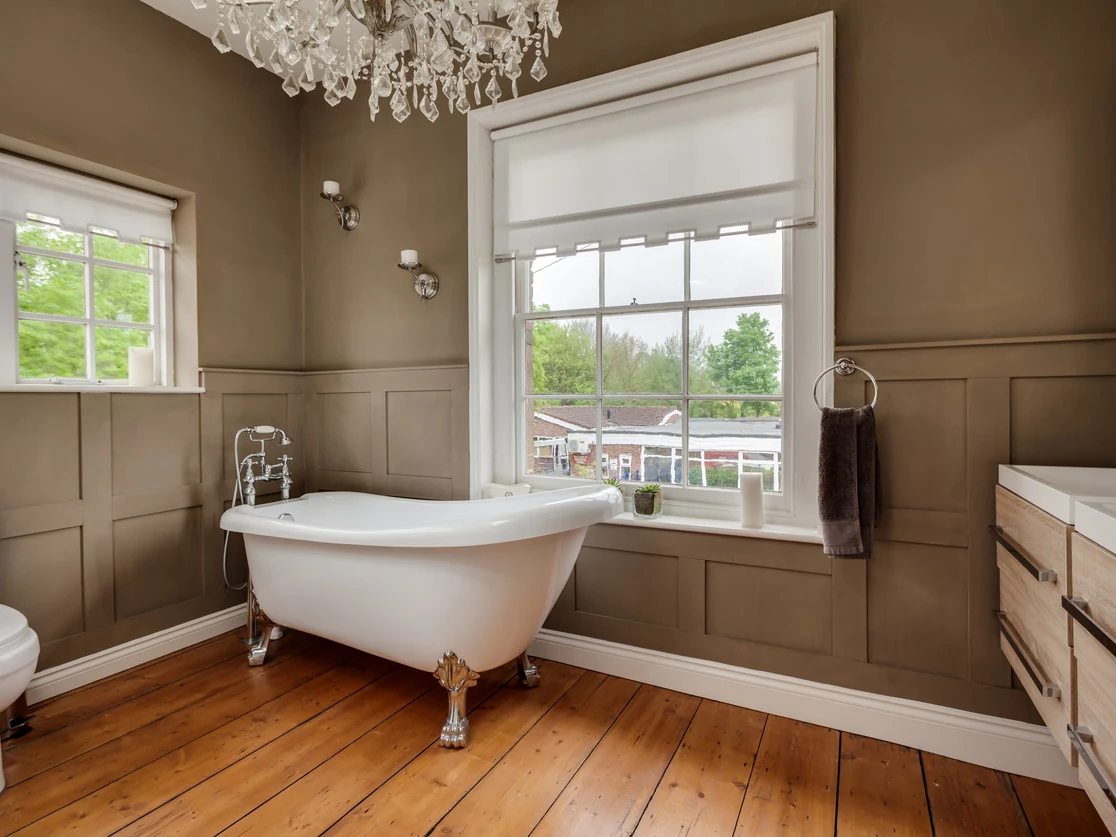 bathroom painting olive brown walls white wainscoting rolltop bath chandelier preston rose decor