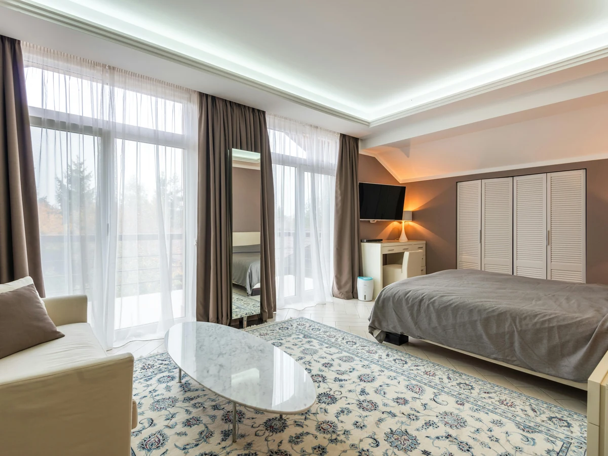 bedroom painting greige walls white tray ceiling cove lighting master bedroom preston rose decor