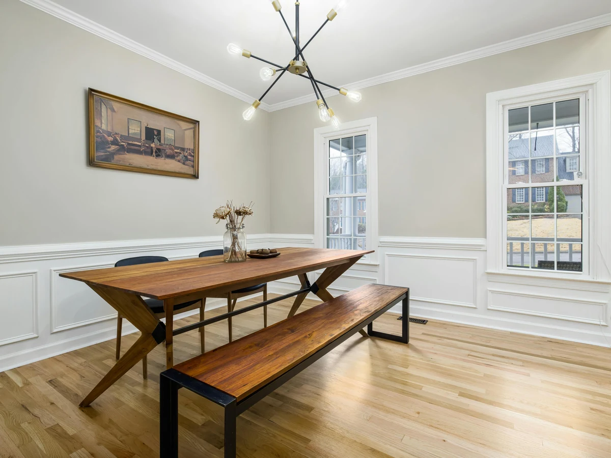 dining room painting pale sage walls white panel moulding bench table preston rose decor