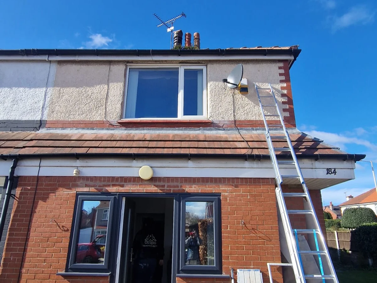 Painters and Decorators Garstang - Rose Decor - Exterior house painting with grey brick fascia