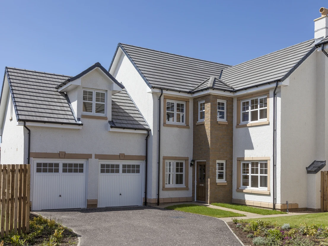 exterior-house-painting-large-new-build-detached-cream-roughcast-sandstone-quoins-double-garage-preston-rose-decor exterior house painting large new build detached cream roughcast sandstone quoins double garage preston rose decor
