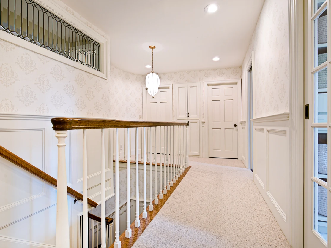 staircase painting cream landing recessed lights glazed door side angle preston rose decor