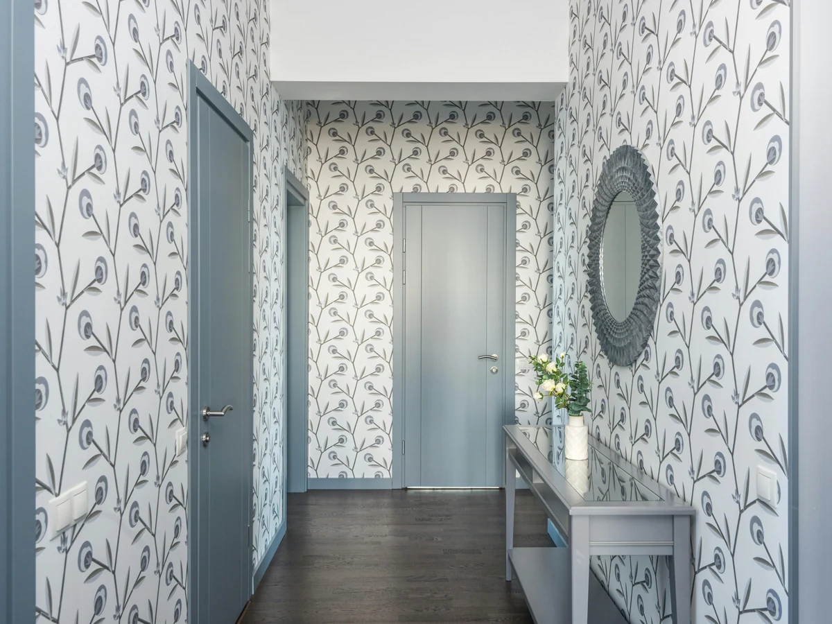 wallpaper-hanging-grey-bird-branch-pattern-hallway-grey-doors-console-table-preston-rose-decor wallpaper hanging grey bird branch pattern hallway grey doors console table preston rose decor